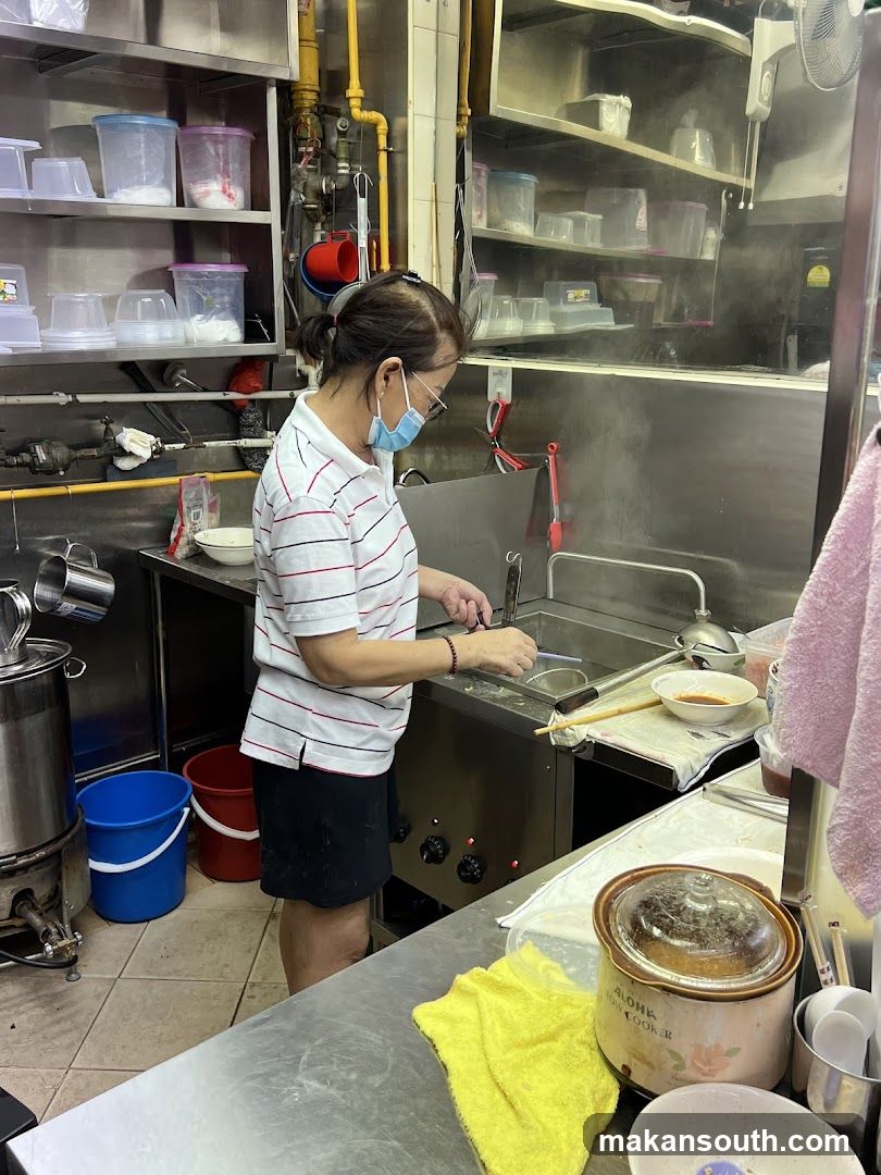 Woman preparing food in a kitchen