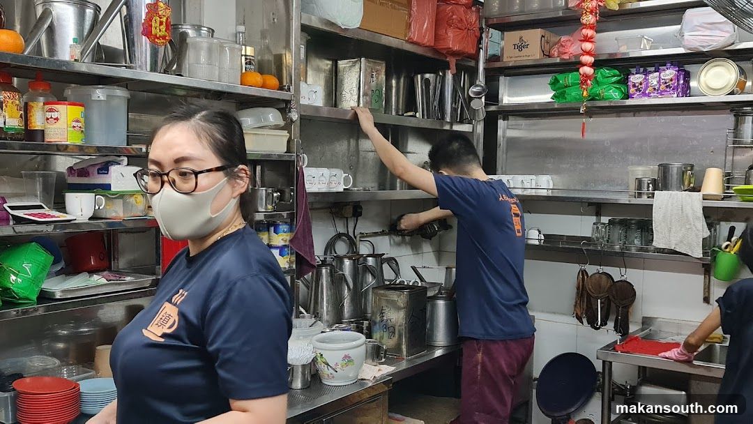 Kitchen Staff Preparing Food