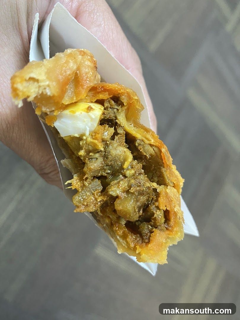 Close-up of a savory pastry filling