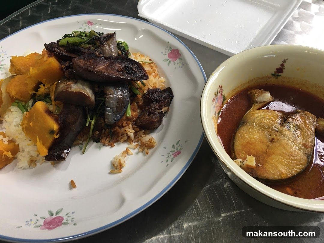 Fish curry with rice and vegetables