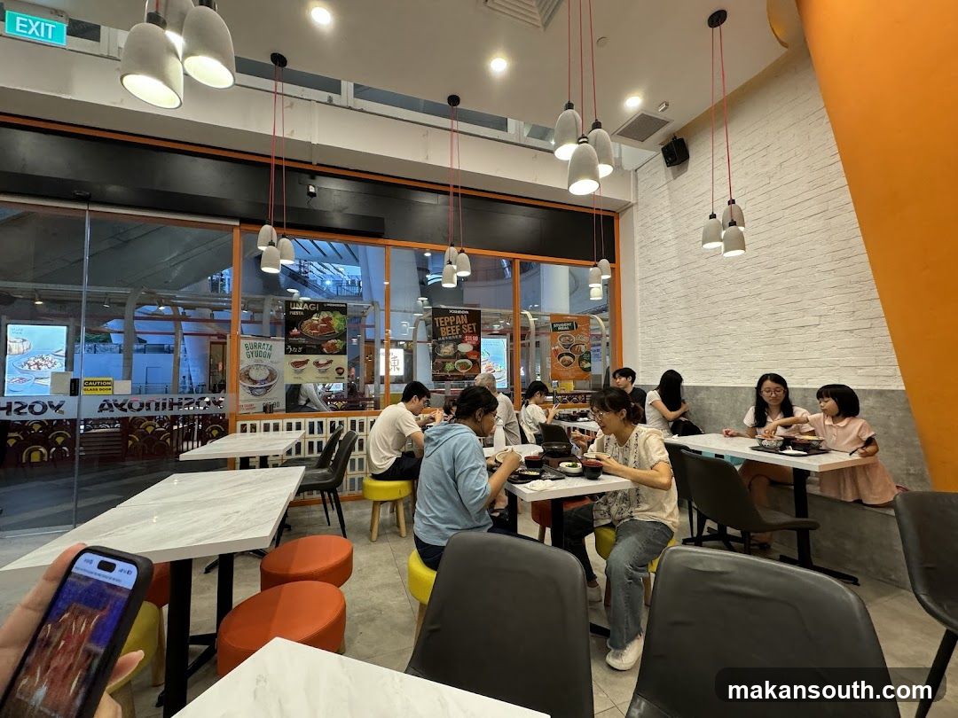 Diners Enjoying Meals at a Restaurant