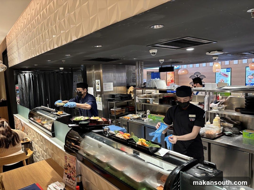 Sushi Chefs Preparing Food