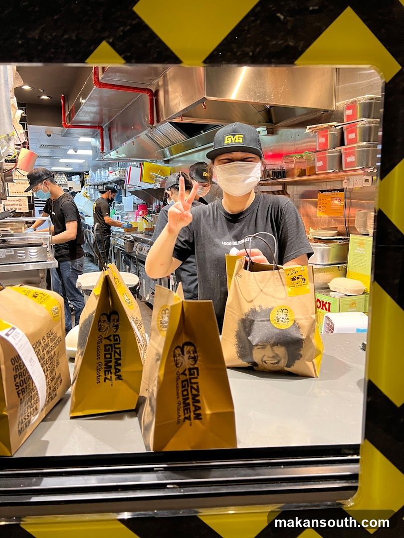 Staff with Takeaway Bags