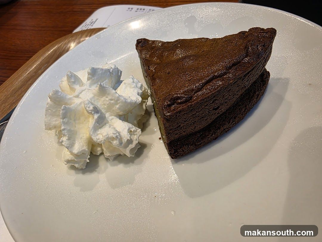 Chocolate cake with whipped cream