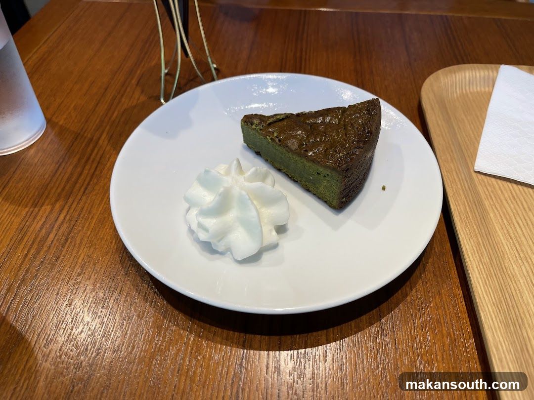 Matcha cake with whipped cream