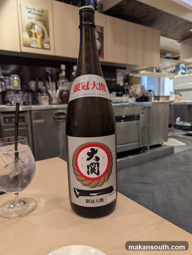 Bottle of Sake on a Table