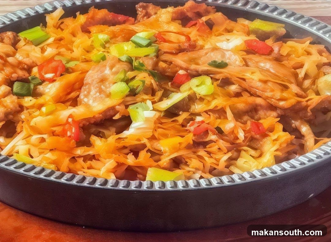 Stir-fried dish with shredded vegetables and meat