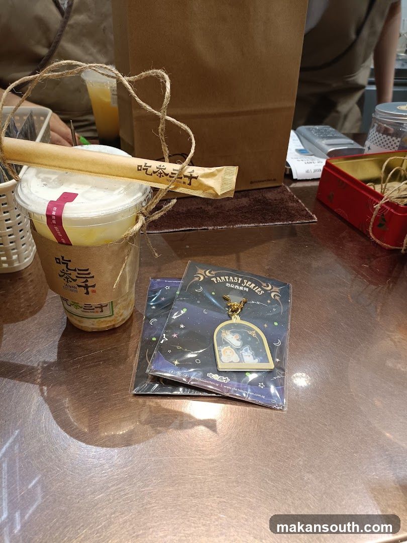 Drink and merchandise on counter