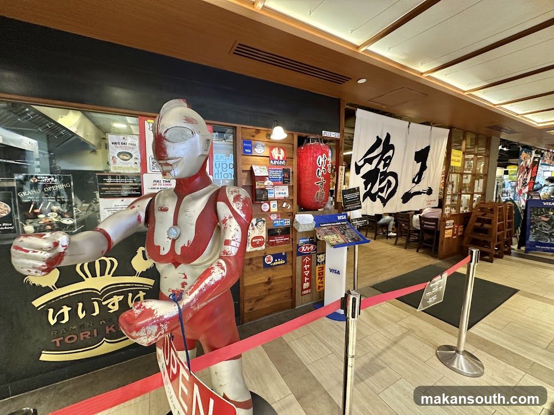 Ramen Restaurant Entrance with Ultraman Statue