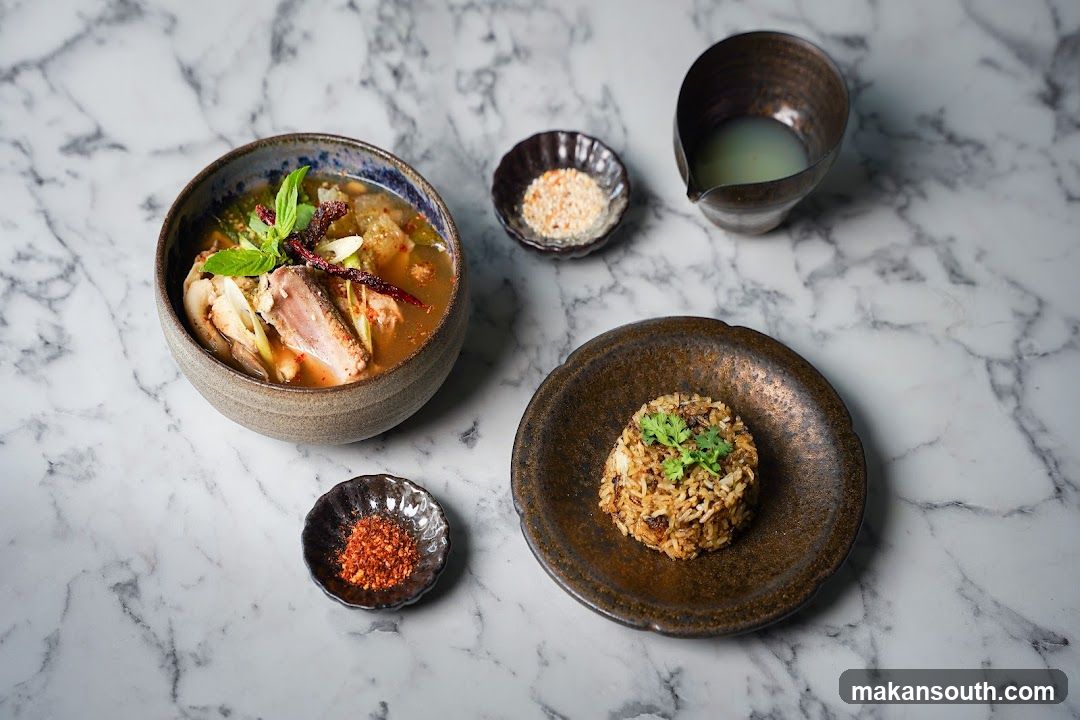 Duck Soup with Rice and Condiments