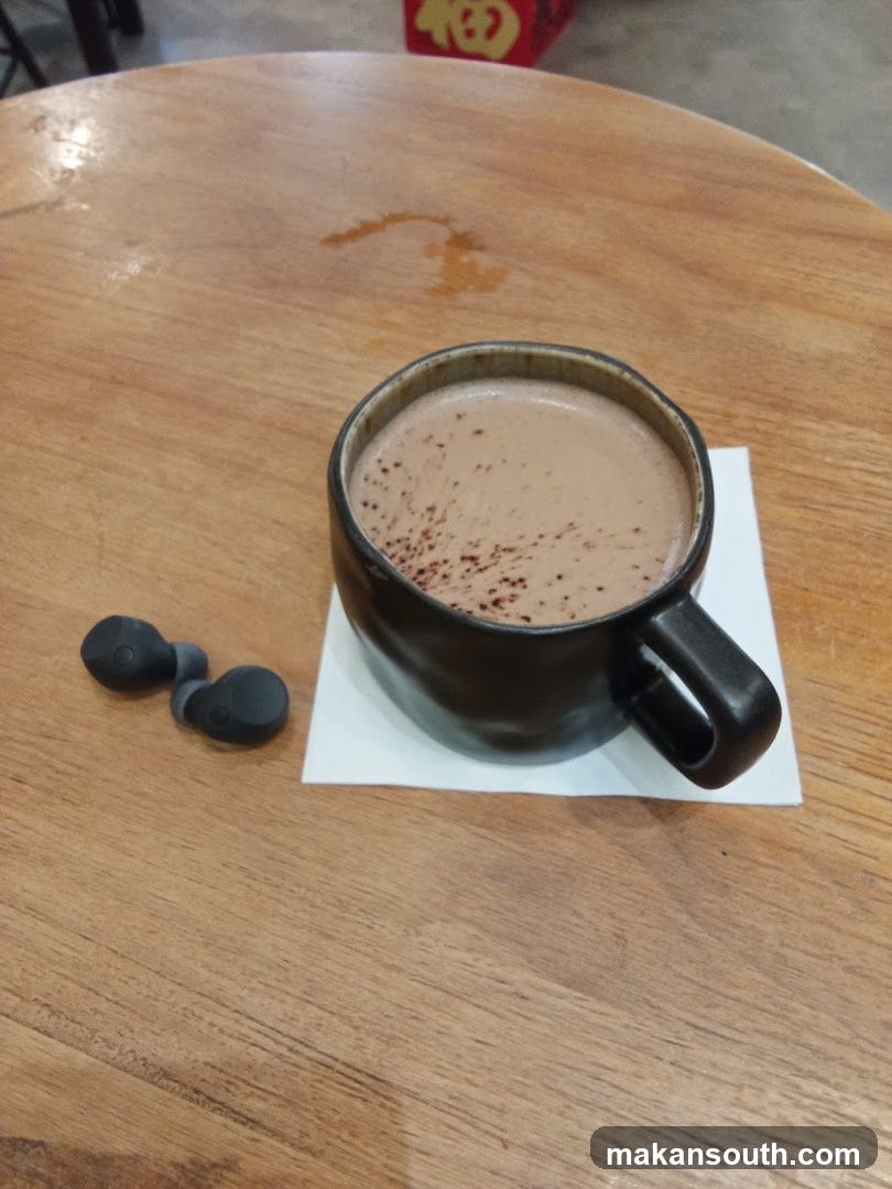 Hot Chocolate and Earbuds