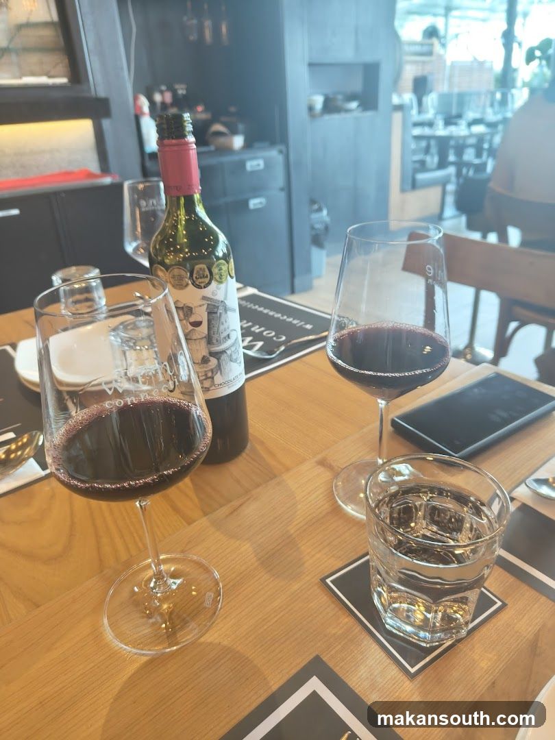 Wine Glasses and Bottle on Table