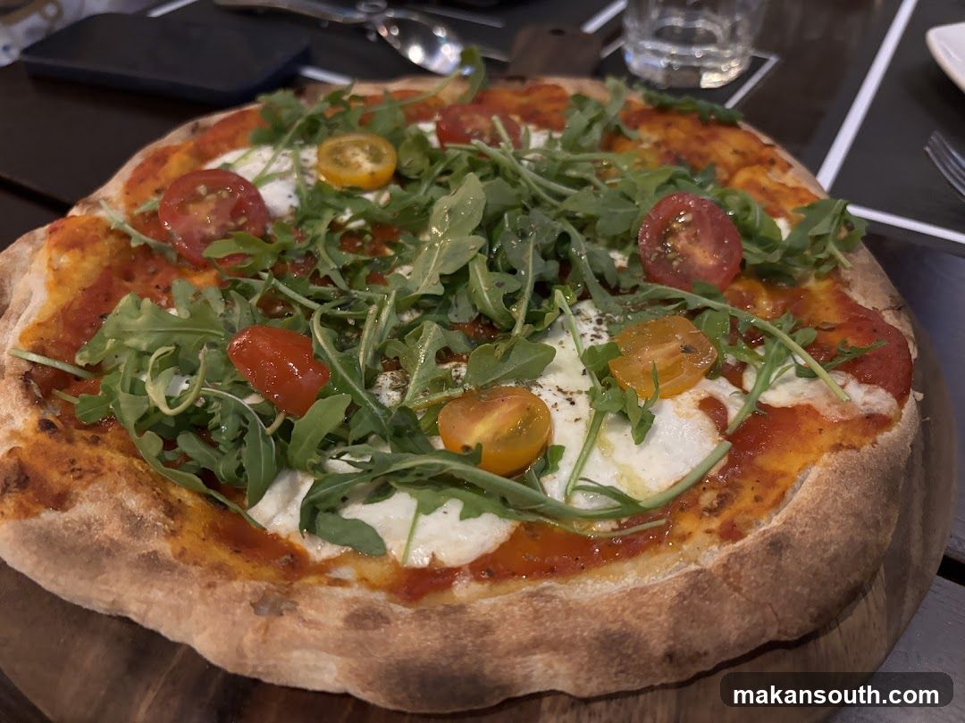 Pizza with Tomatoes and Arugula