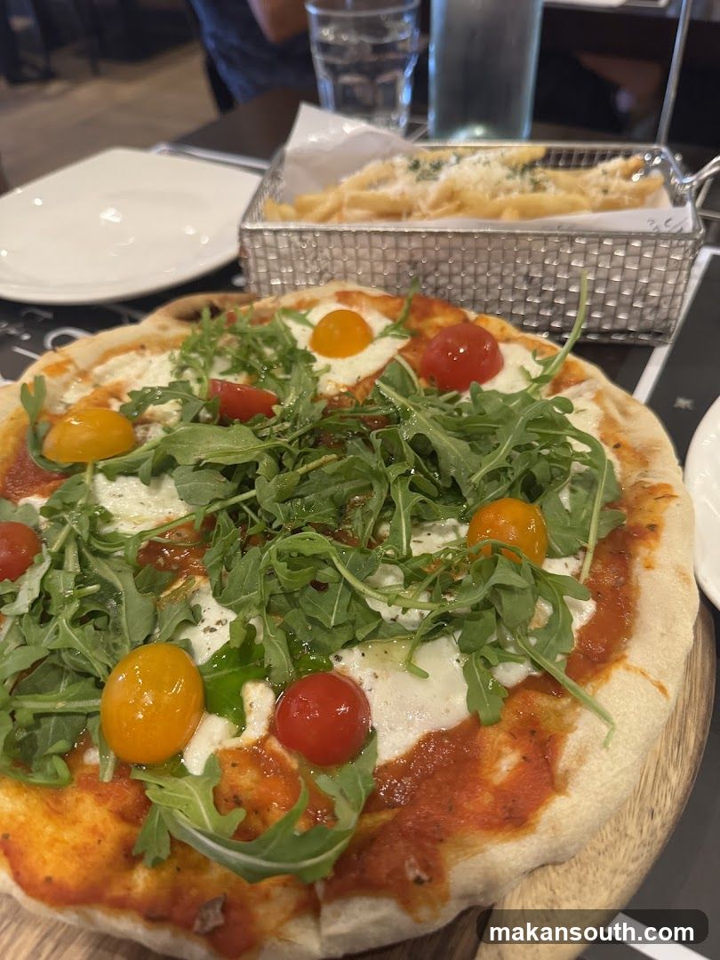 Pizza with Cherry Tomatoes and Arugula