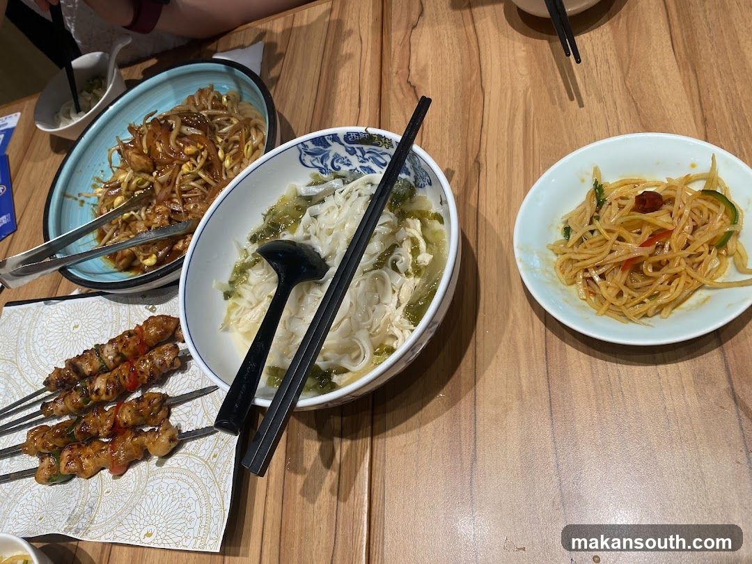 Various Dishes on a Wooden Table