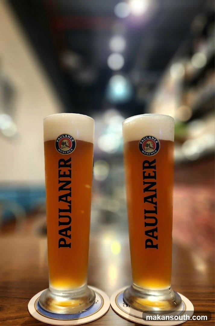Two glasses of Paulaner beer