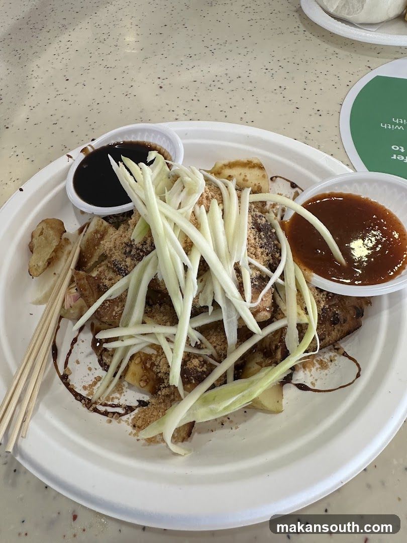 Rojak dish with dipping sauces