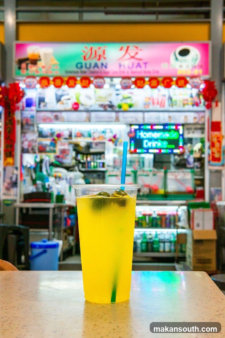 Yellow Drink with Ice and Straw