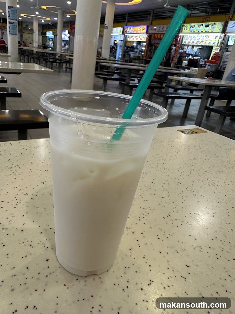Beverage in a plastic cup with a straw