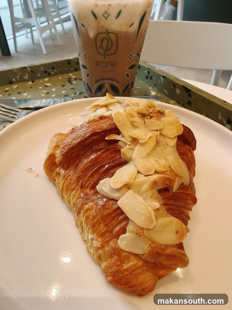 Almond Croissant and Coffee