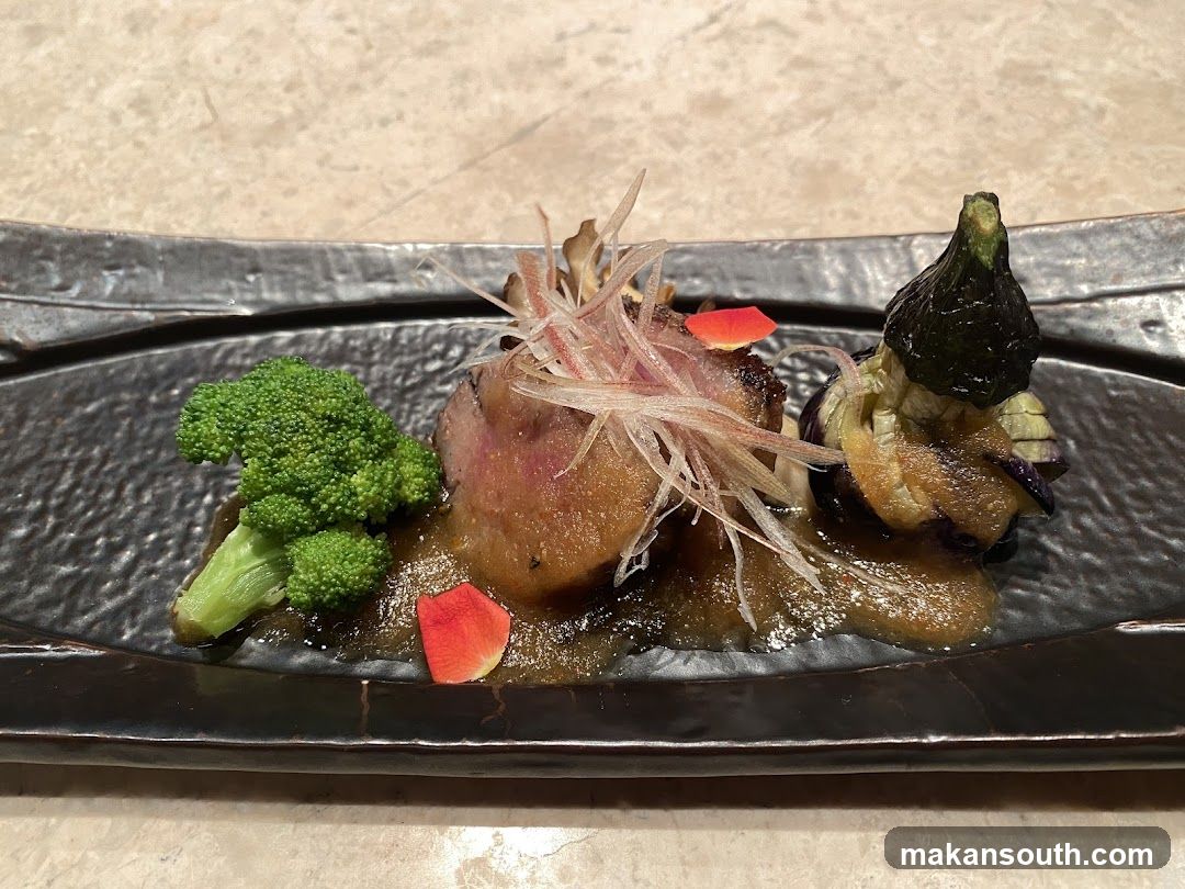 Gourmet Dish with Meat, Broccoli, and Eggplant