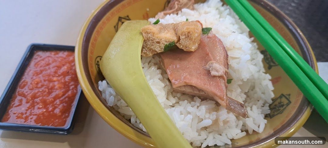 Rice dish with meat and chili sauce