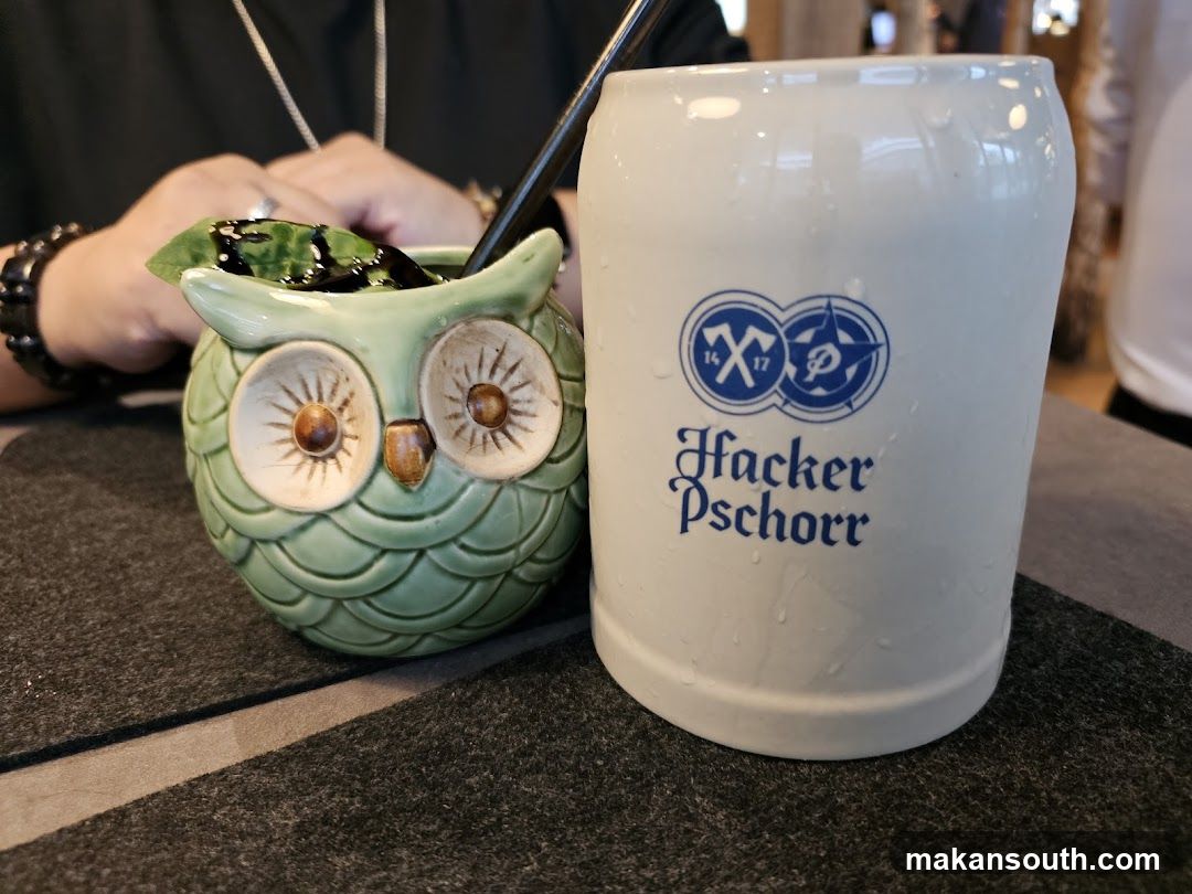 Owl-shaped cocktail glass and beer stein