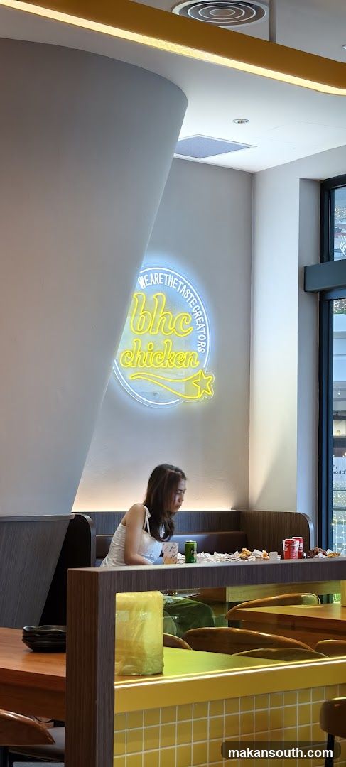 Interior of a restaurant with neon sign