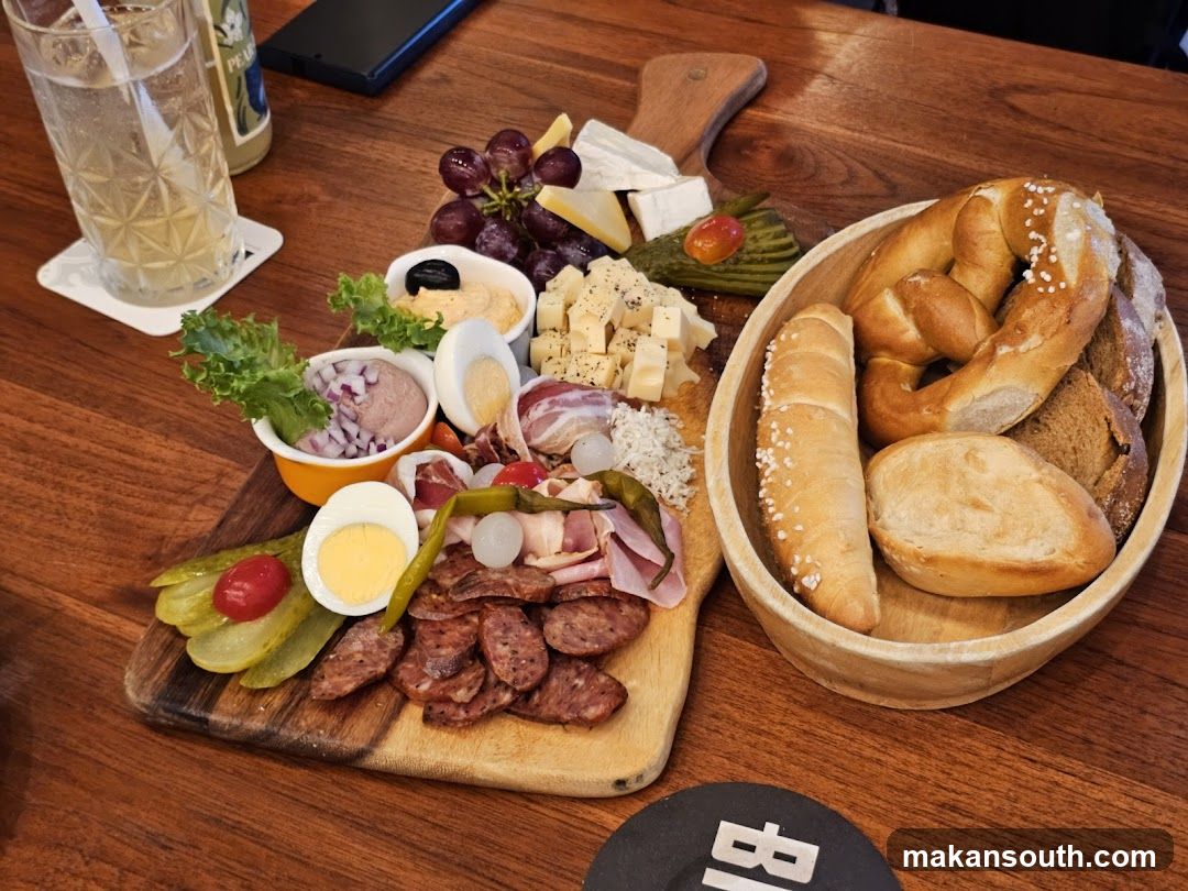 Charcuterie Board with Bread and Drinks