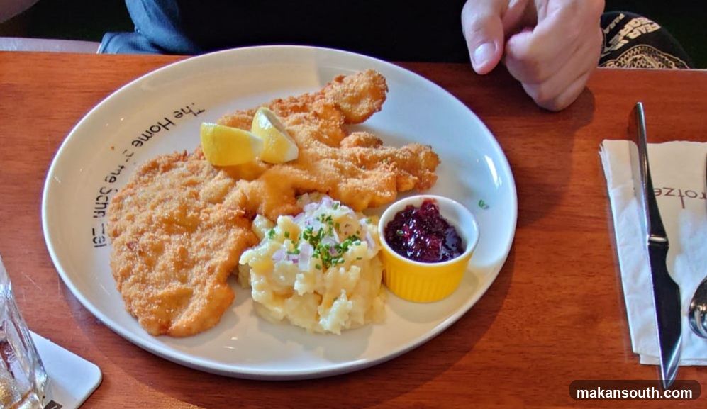 Schnitzel with Potato Salad and Cranberry Sauce