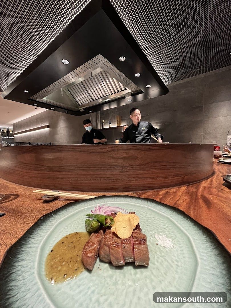 Chefs preparing food at a counter