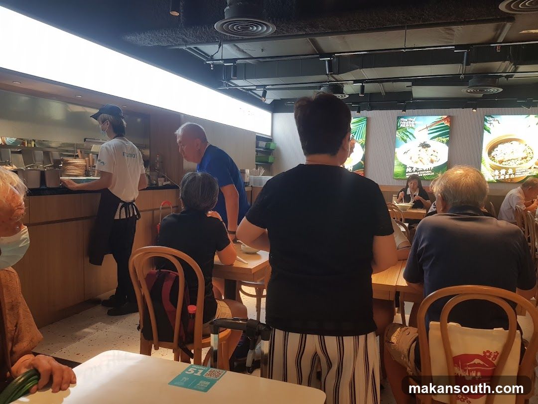 Restaurant Interior with Diners and Staff
