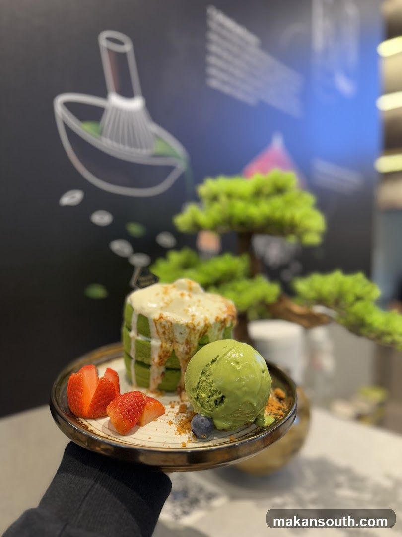 Matcha dessert with ice cream and strawberries