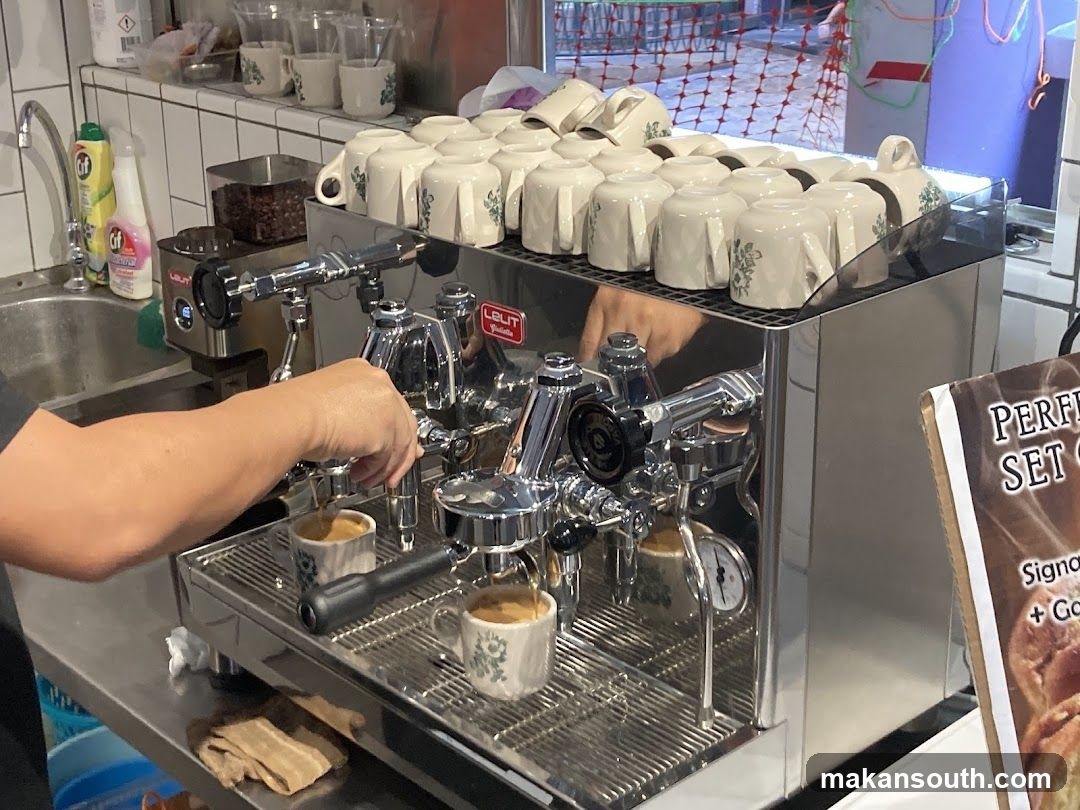 Barista making coffee