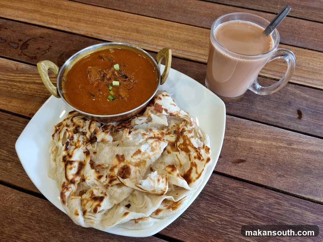 Roti Canai with Curry and Teh Tarik
