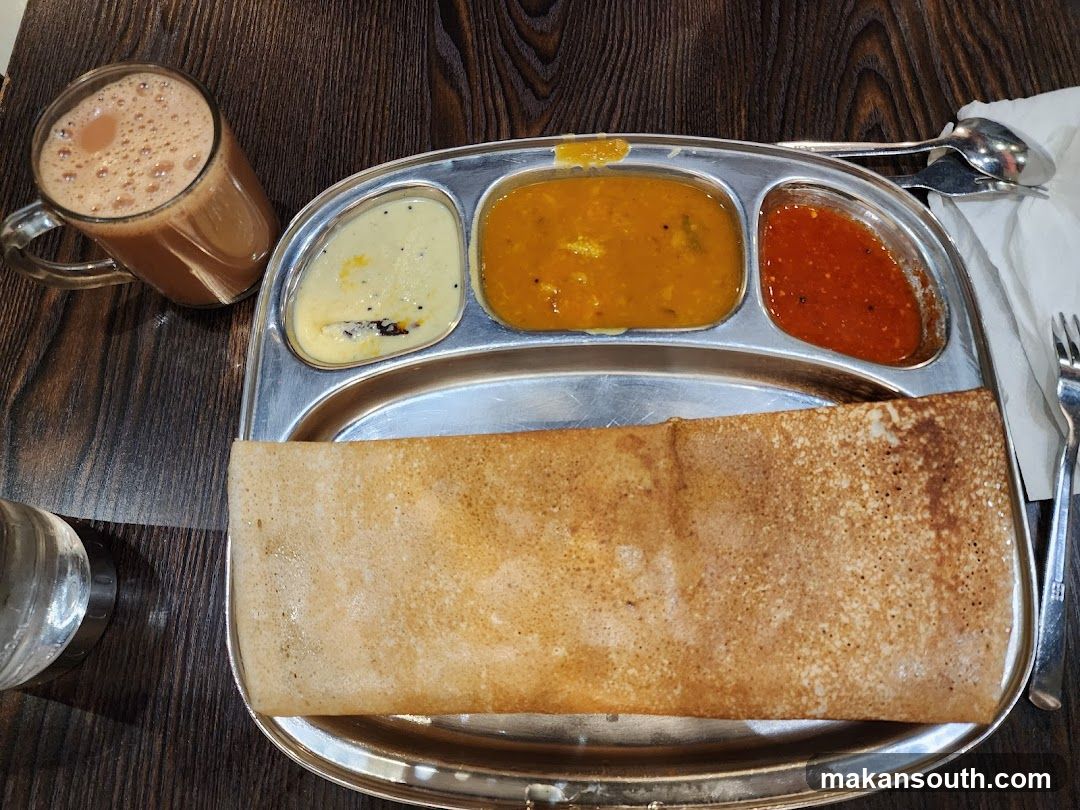 Dosa with accompaniments and tea