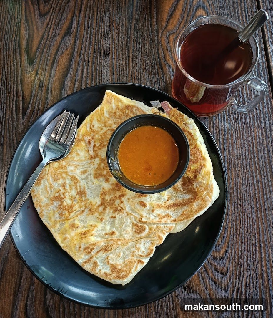 Roti Canai with Curry and Tea