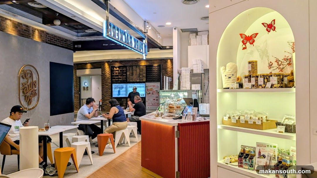 Cafe Interior with Seating and Display Shelves