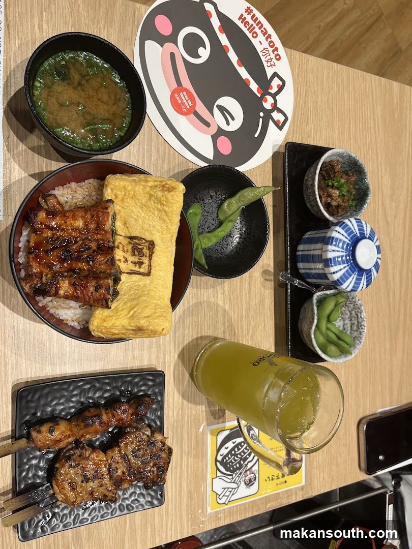 Japanese Meal with Grilled Skewers and Drink