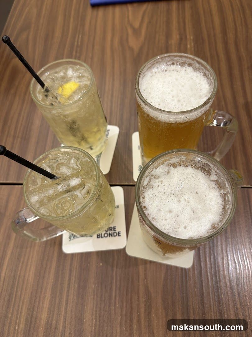 Four Drinks on a Wooden Table