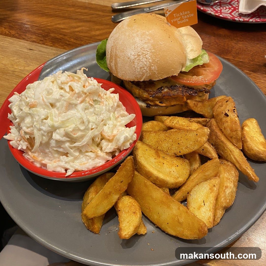 Burger with Coleslaw and Potato Wedges