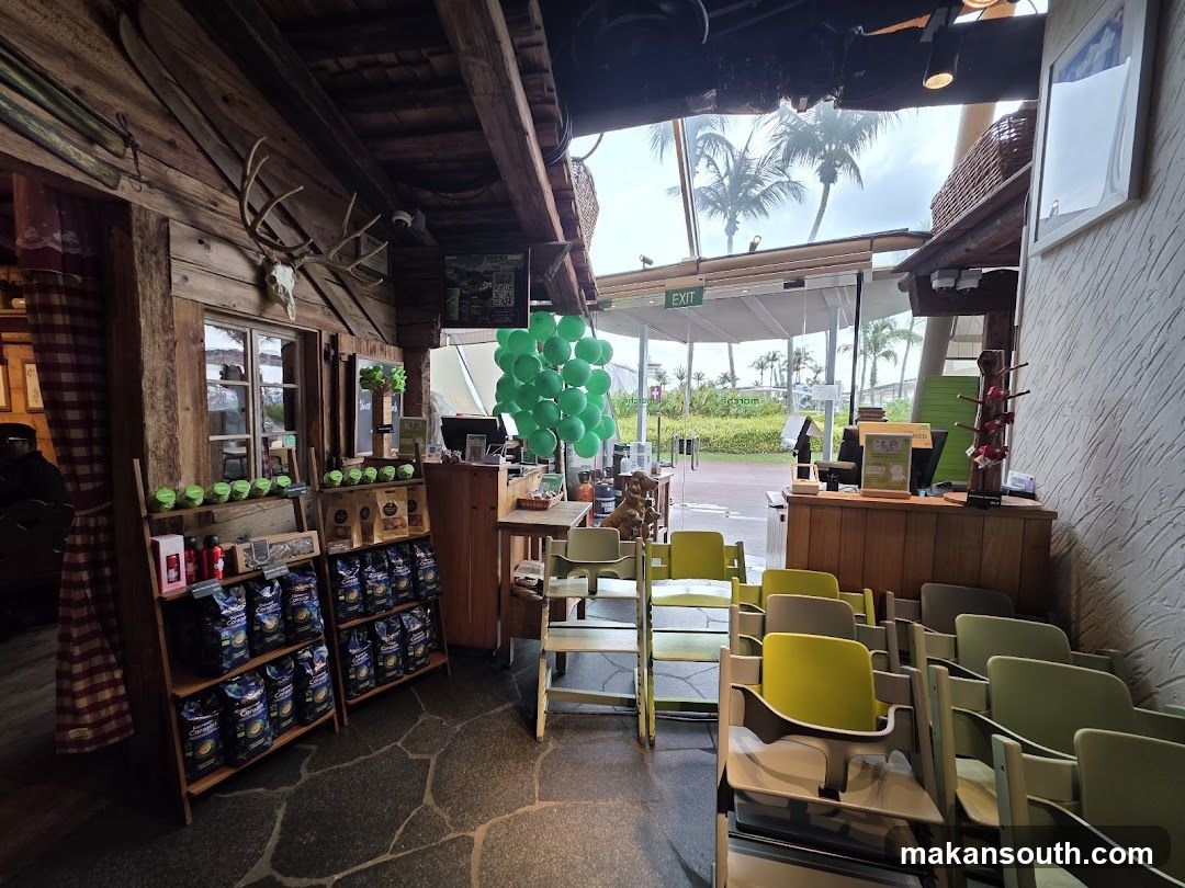 Interior of a rustic cafe with seating and merchandise