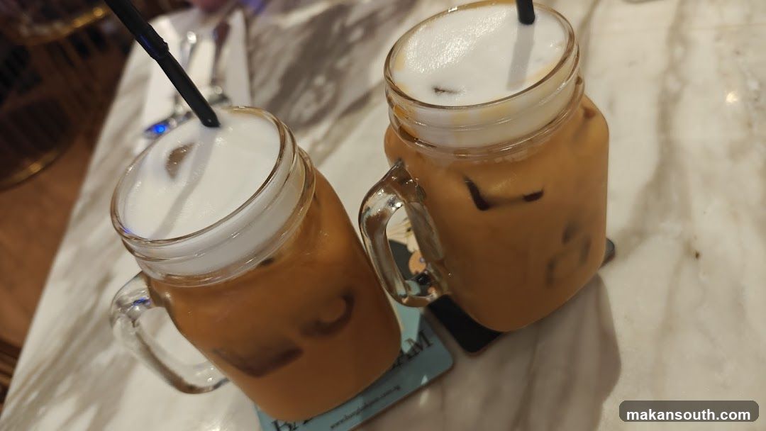 Two iced Thai tea drinks