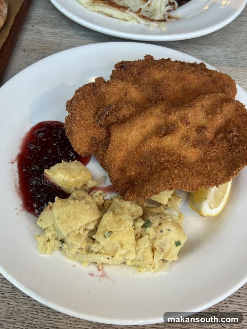 Schnitzel with Potato Salad and Lingonberry Sauce