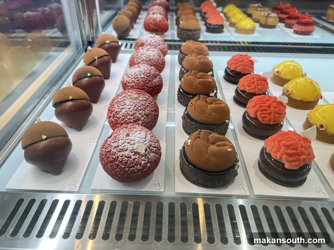 Assortment of Pastries in a Display Case