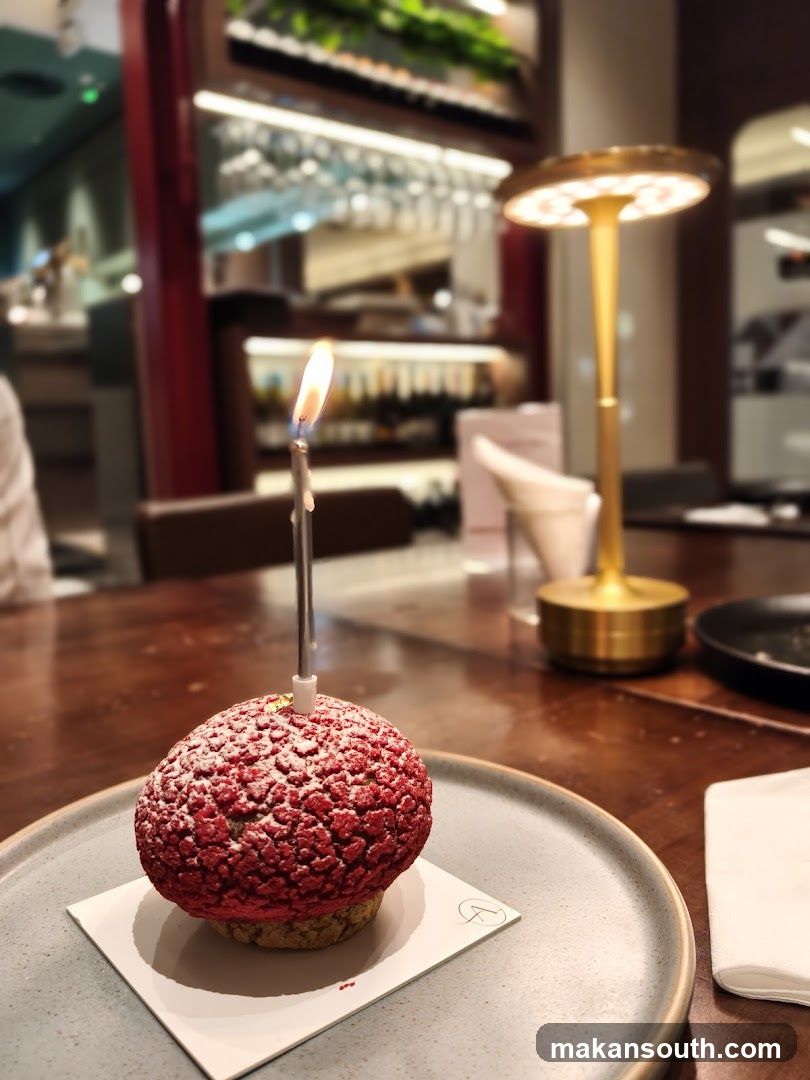 Dessert with a lit candle