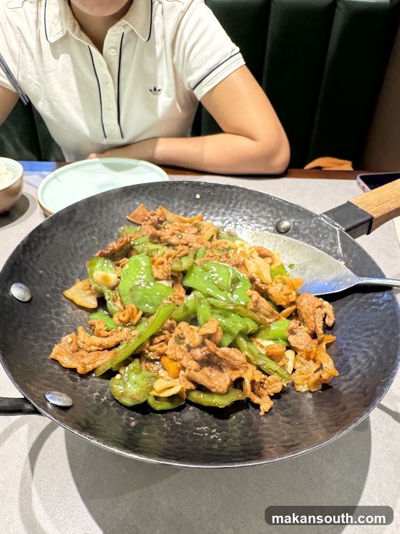 Stir-fried dish with green peppers and meat