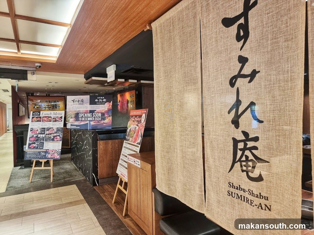 Restaurant Entrance with Menus and Signage