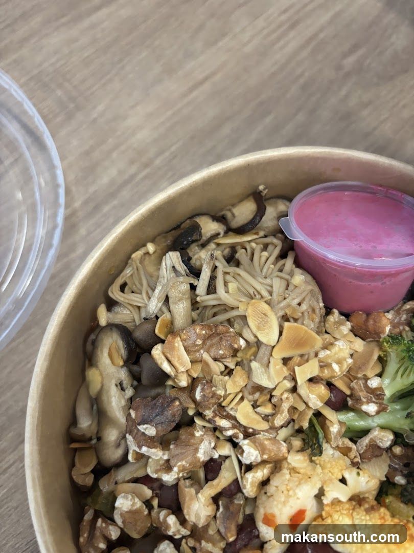 Bowl of food with mushrooms and nuts