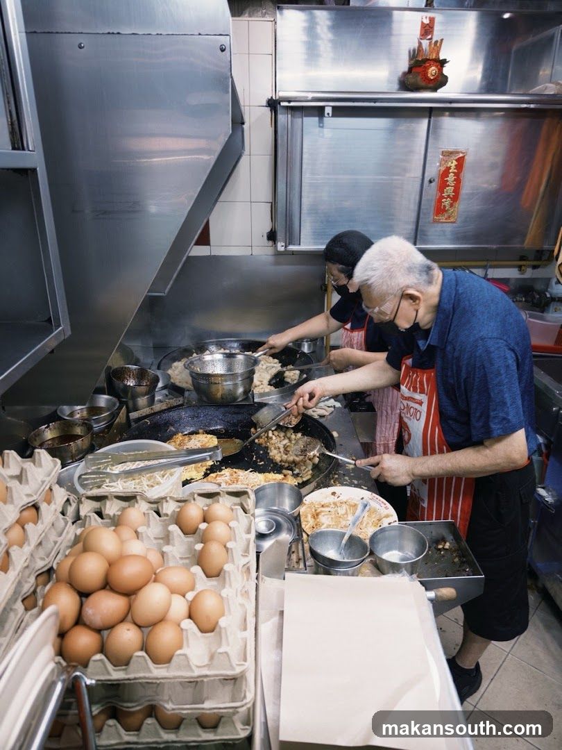 Chefs preparing food in a kitchen